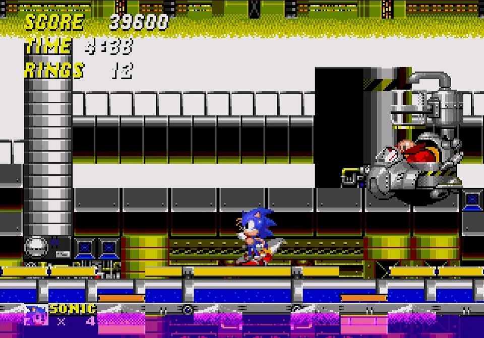 Sonic beside Dr Robotnik's machine at the end of Chemical Plant Zone in Sonic the Hedgehog 2